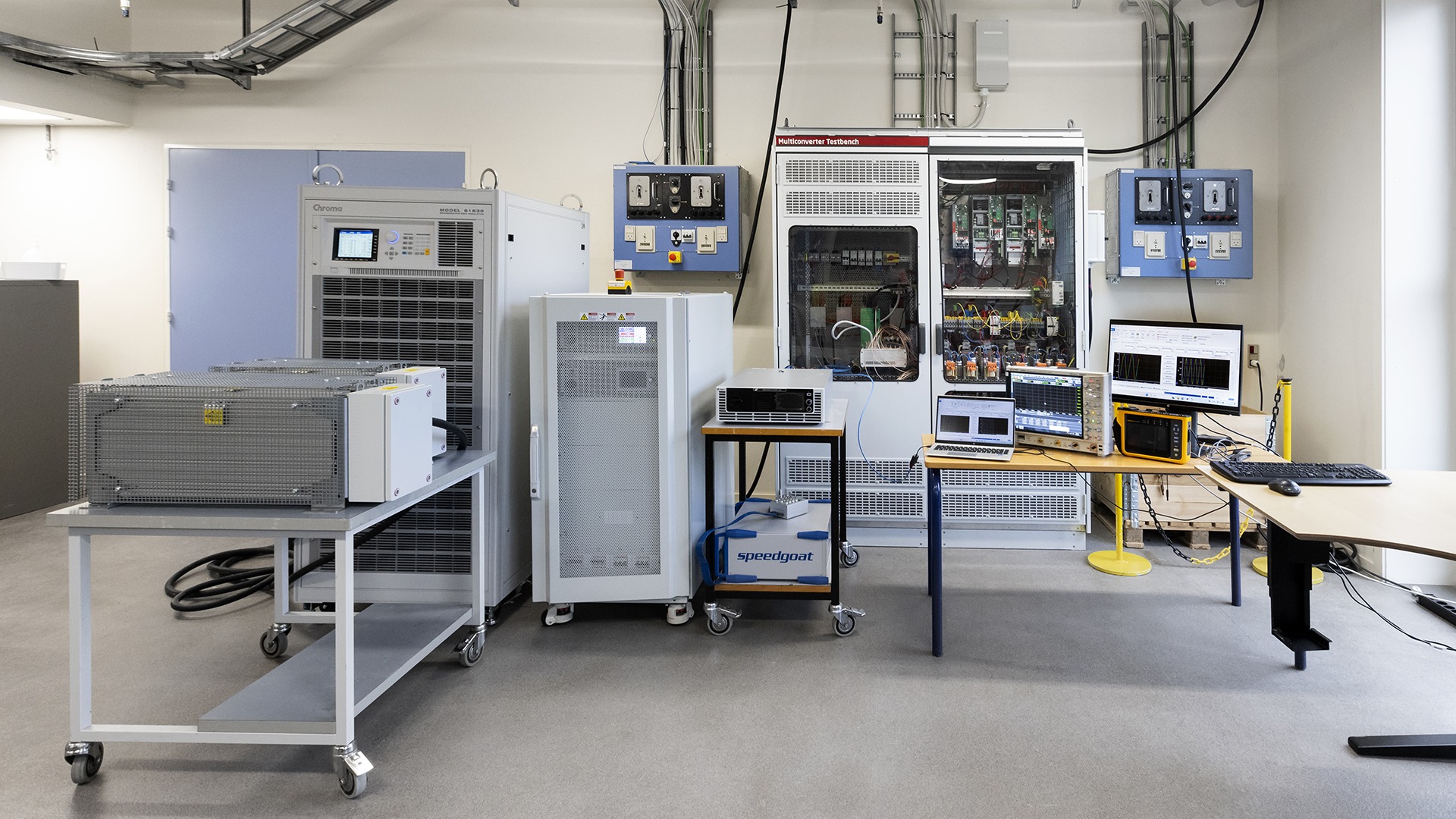 Integrated power test system with equipment racks, measurement instruments and a computer control station at DTU.